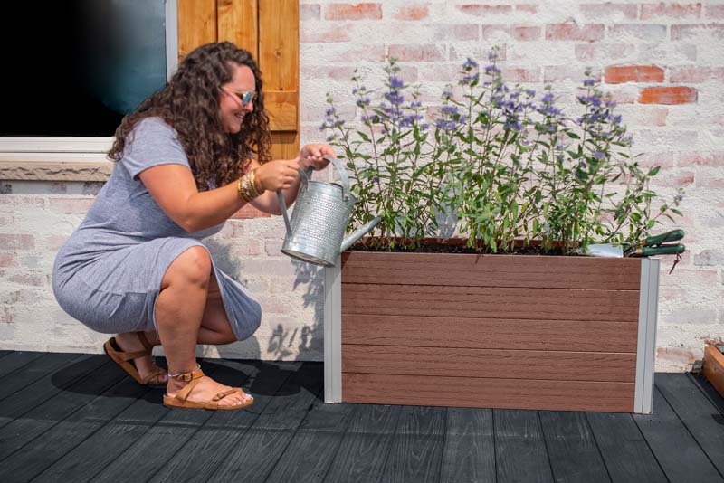Urbana Small Parklette Planter being watered
