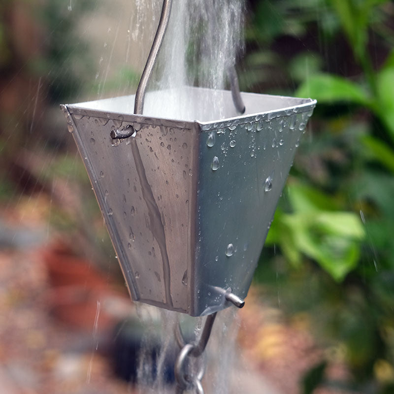 close up of unfinished aluminum Tapered Square Cups Rain Chain